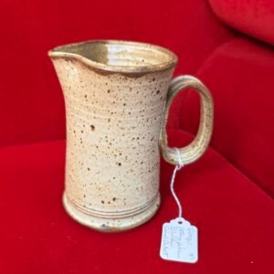 Blonde Pottery pitcher signed by artist